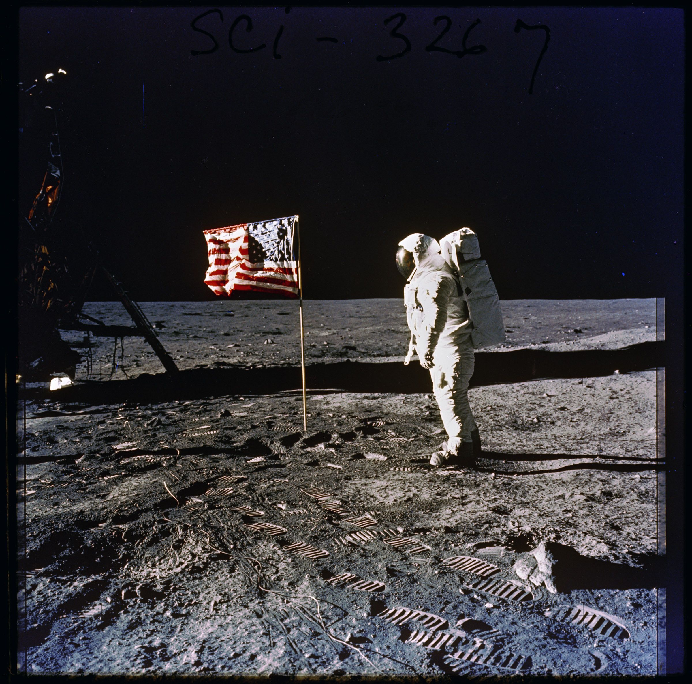 History By Mail - Apollo 11 Astronaut Edwin Aldrin posed on moon next to an American flag on July 20, 1969.