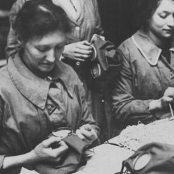 Women at work in a British gas mask factory