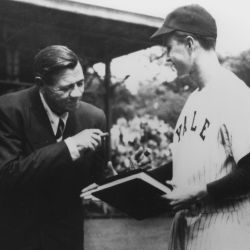George Bush, captain of the Yale baseball team, receives Babe Ruth