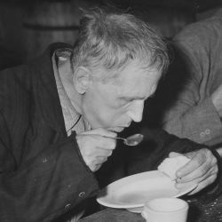 Farm Security Administration - Works Progress Administration: Unemployed men eating in Volunteers of America Soup Kitchen in Washington, D.C.