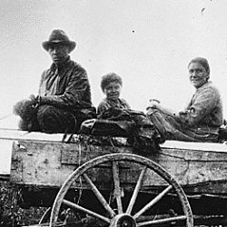 Family and goods in wagon. White Earth Res., Minnesota