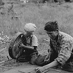 Boys play a moccasin game