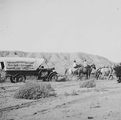 Automobile helped through sandy wash onto mesa, 7 miles northwest of Yuma, Calif. by A. L. Westgard