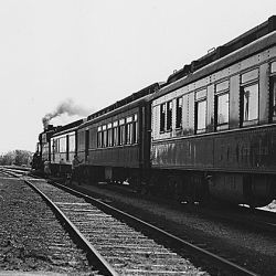 Shelby County, Iowa. Several trains a day stop at the Irwin depot, most of them just long enough to...