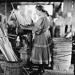A basket factory. Girls making melon baskets. Evansville, Ind.