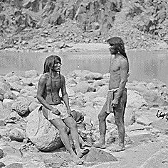 Two Mohave braves dressed in loincloths; full-length, standing, western Arizona