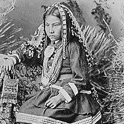 Chiricahua Apache girl, granddaughter of Cochise; full-length, seated