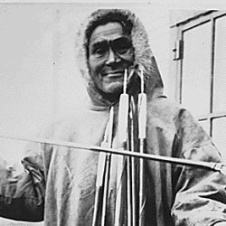 Simiguluk, an Eskimo spear and lancemaker with his wares, Point Barrow, Alaska