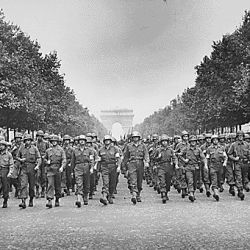 American troops of the 28th Infantry Division march down the Champs Elysees, Paris, in the "Victory" Parade