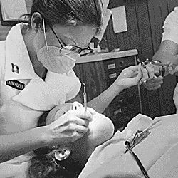 Fort Stewart, Georgia. Female Army dentist. CPT Jeannine Nordeen (Doctor), an Army Dentist assigned to DENTAC, is making a gold crown for a patient
