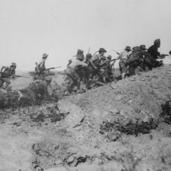 Scene Just Before the Evacuation at Anzac. Australian troops Charging near a Turkish trench. When they got there the Turks had Flown. Dardanelles Campaign