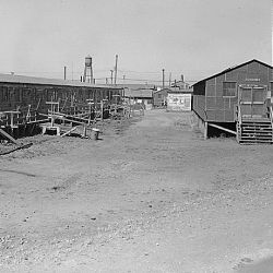 San Bruno, California. Another view of barracks at the Tanforan Assembly center, after approximately . . .