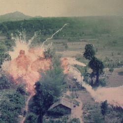 Napalm Bombs Explode on Viet Cong Structures