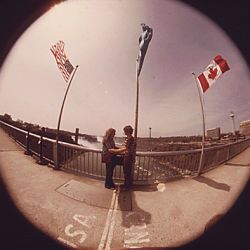 "Fish-Eye" Camera View of the United States-Canada Boundary Line on Rainbow Bridge, which Spans the Niagara River Just Below the Falls.  The Bridge Joins New York State and the Province of Ontario