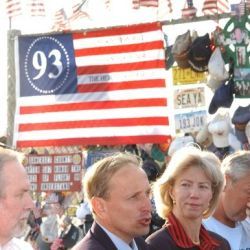 Secretary Gale Norton, third from left, participating in flag ceremony at the temporary memorial, near Shanksville, Pennsylvania, honoring the passengers and crew of Flight 93, hijacked on September 1