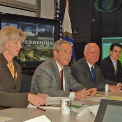 Secretary Gale Norton with President George Bush and Energy Secretary Samuel Bodman, left to right, at Department of Energy Emergency Operations Center briefing, concerning the impact of Hurricanes Ka