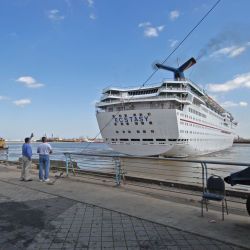 [Hurricane Katrina] New Orleans, LA, 03-2-06 -- Carnival Cruise Ship Ecstasy leaves port after completing her FEMA Contract to house and feed disaster victims. Using the ships for emergency housing al