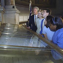 President William Clinton and Hillary Rodham Clinton Looking at the Declaration of Independence