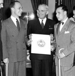President Harry S. Truman Presents the Official Insignia of the Blinded Veterans Association, Inc., to the Executives of the Organization