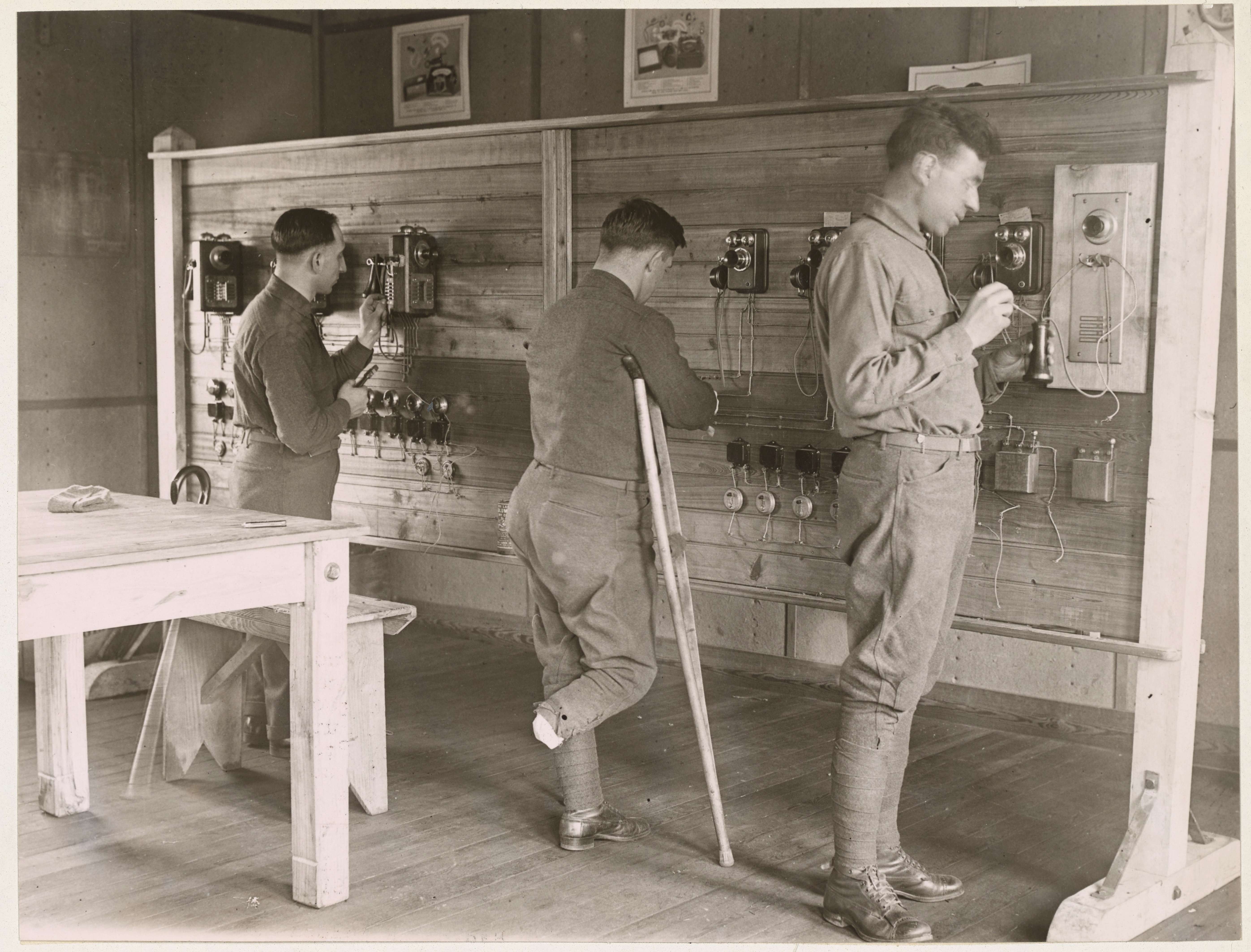 Disabled soldiers repairing telephones at General Hospital Number 3, Colonia, New Jersey.