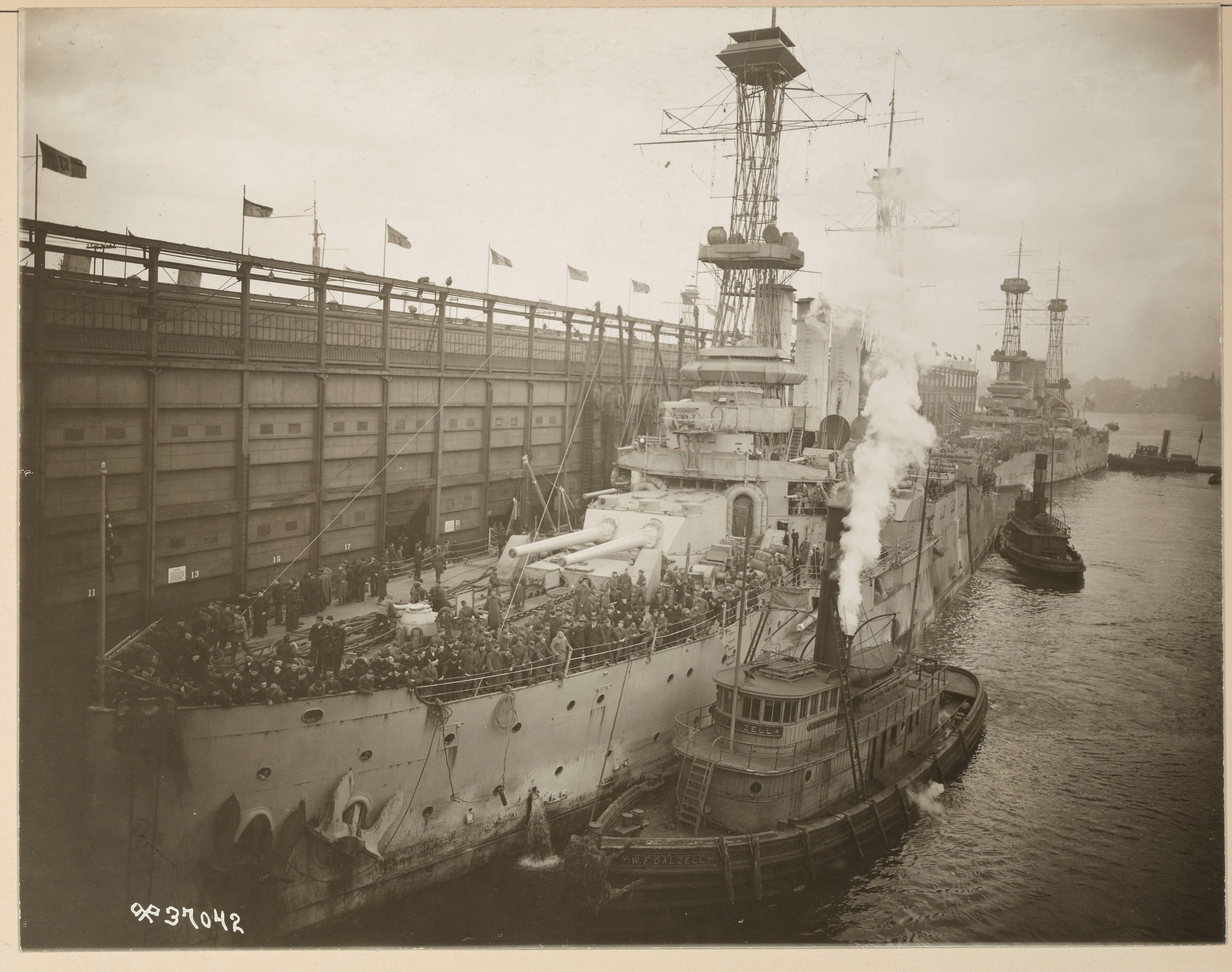 Battleships Louisiana and New Hampshire dock at Hoboken, New Jersey