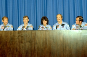 Space shuttle Challenger astronauts attend a press conference upon their return