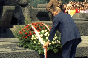 President Gerald R. Ford Arranging a Wreath Placed at the Oswiecim (Auschwitz) International Monument at the Site of Auschwitz Concentration Camp in Poland