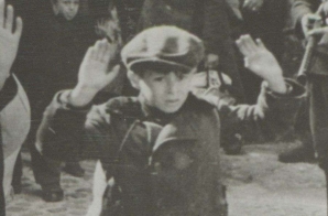 Boy with Hands Raised, Warsaw, Poland