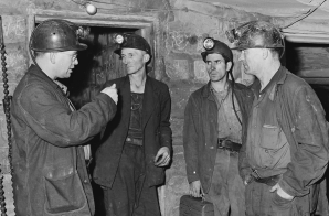 Section foreman gives instructions to miners at last station