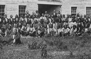 Delegates from 34 tribes in front of Creek Council House, Indian Territory