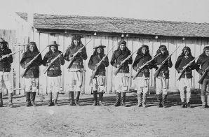 Apache scouts drilling with rifles, Fort Wingate, New Mexico