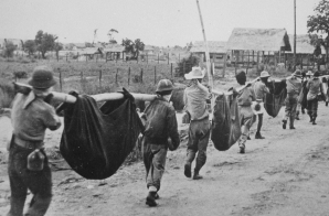 American Prisoners Using Improvised Litters to Carry Comrades