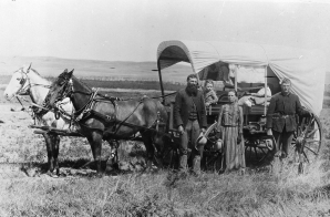 Family with Their Covered Wagon During the Great Western Migration
