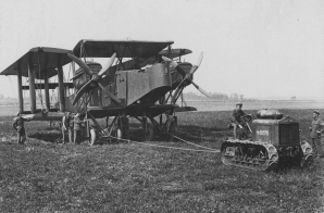 Tractor Hauling Bombing Plane into Position