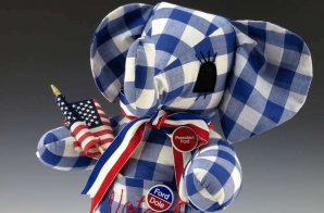 Blue and White Gingham Stuffed Elephant With the Word “Vote” Embroidered in Red