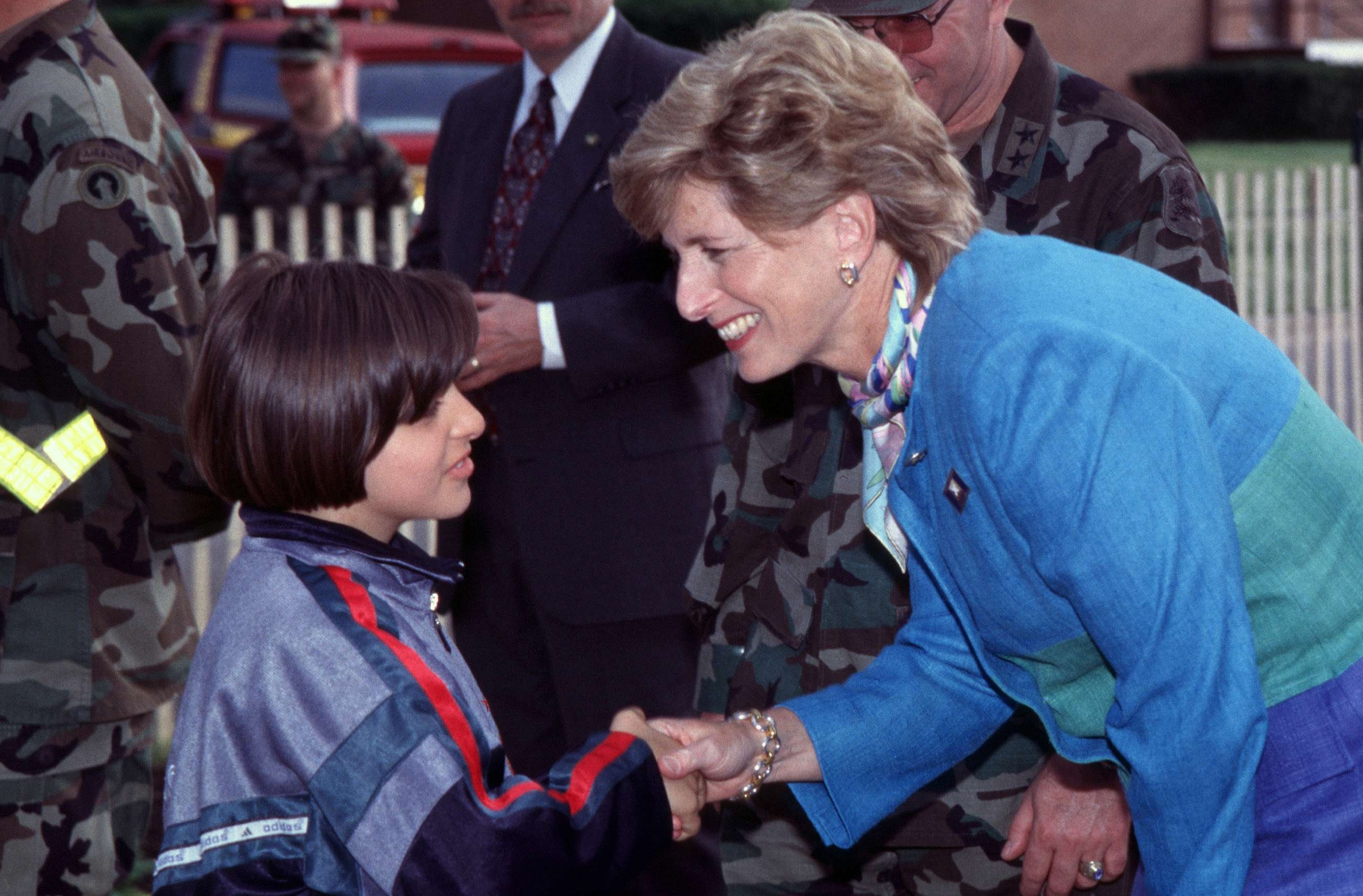 Christie Todd Whitman Chats with a Young Kosovar Refugee