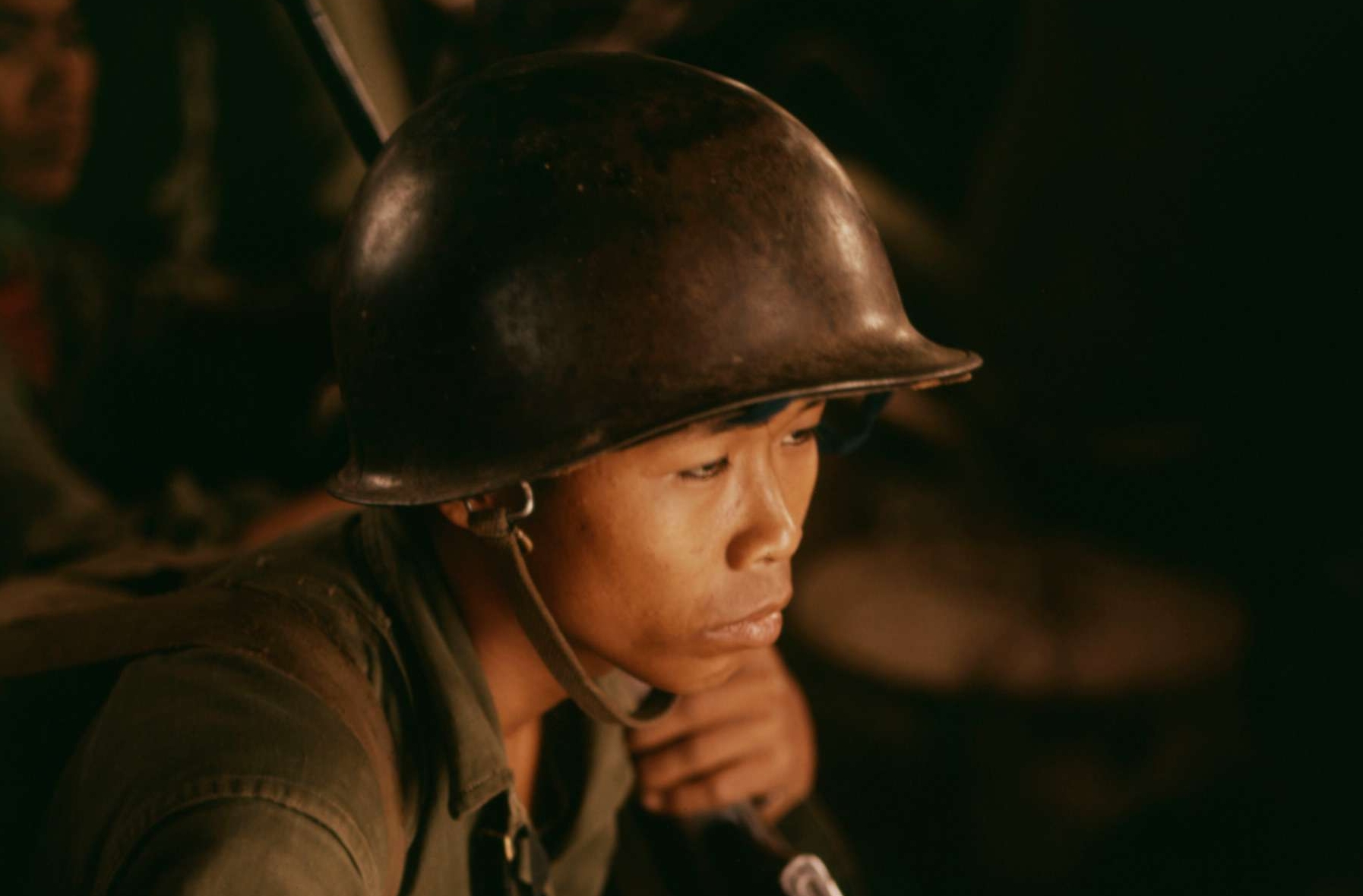 South Vietnamese Soldier Watching From Helicopter